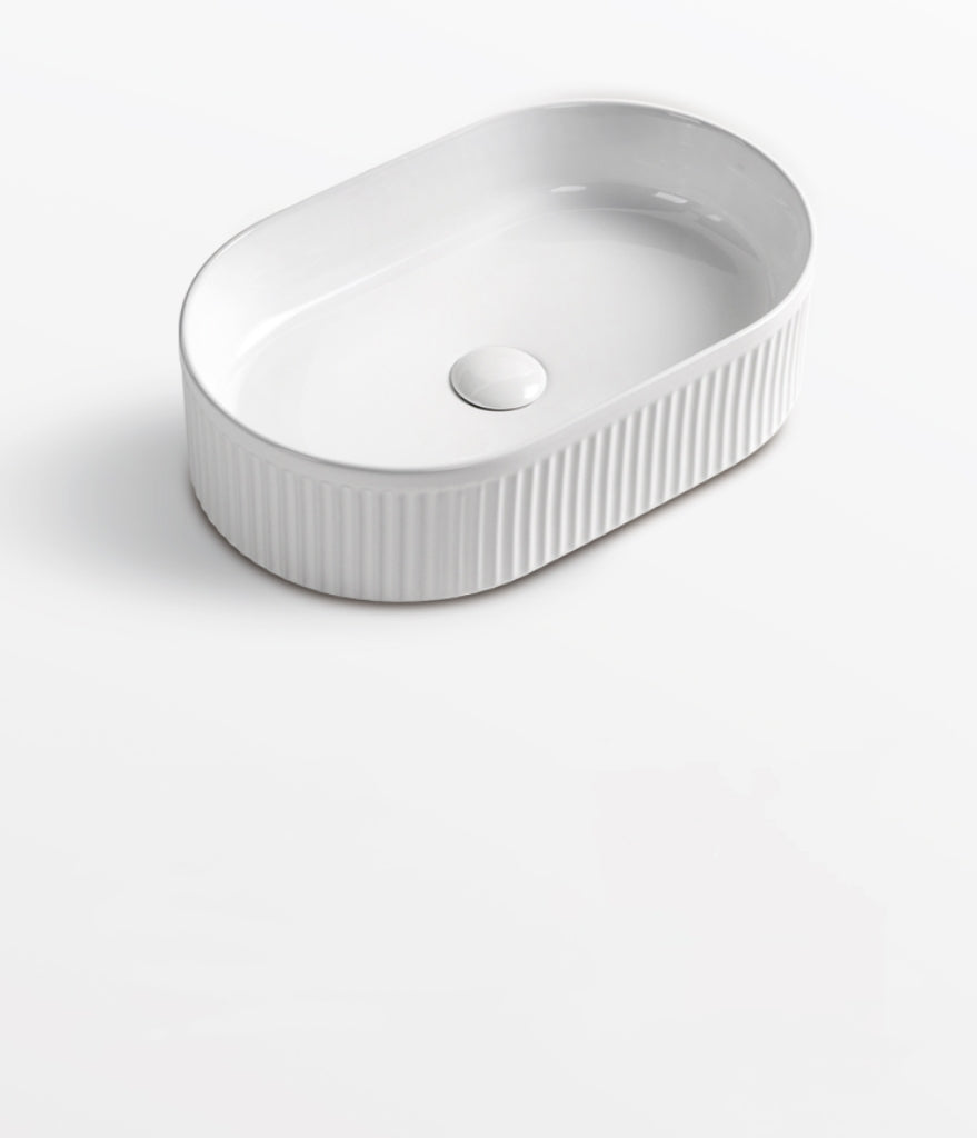 490 x 310 x 130mm Oval Matte White Fluted Above Counter Ceramic Basin